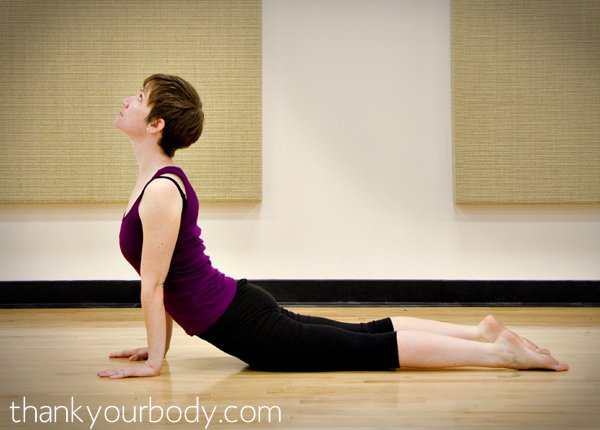 Learn simple stretches and tips to combat bad posture from breastfeeding.